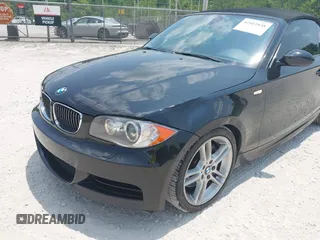2009 BMW 1 Series 135i with VIN WBAUN93569VK40357, listed as a IAAI auction lot 42412038 with 141,944 mi miles and . Bid and sale history available at DreamBid. Image 6.