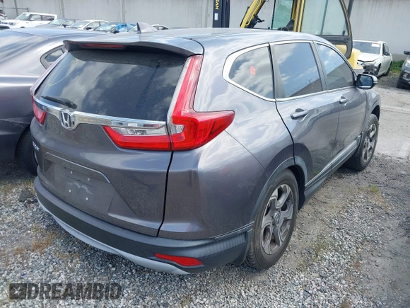 2017 Honda CR-V EX with VIN 7FARW1H5XHE028630, listed as a IAAI auction lot 41967002 with 73,688 mi miles. Bid and sale history available at carsss.com. Image 4.