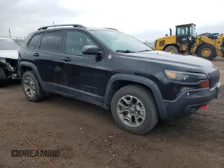 2020 Jeep Cherokee Trailhawk with VIN 1C4PJMBX2LD588381, listed as a Copart auction lot 56067055 with 82,467 mi miles and Salvage title. Bid and sale history available at DreamBid. Image 4.