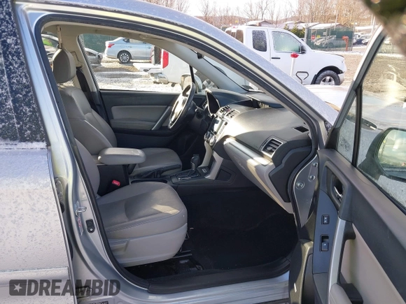 2016 Subaru Forester Touring z VIN JF2SJAXC4GH536085, wystawiony jako IAAI lot #41838081 z przebiegiem 155 930 mil mil oraz . Historia ofert i sprzedaży dostępna na DreamBid. Obrazek 5.