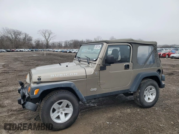 2004 Jeep Wrangler Rubicon with VIN 1J4FA69S24P743345, listed as a Copart auction lot 87067154 with 153,783 mi miles and Salvage Title. Bid and sale history available at carsss.com. Image 1.