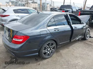 2014 Mercedes-Benz C C 250 Sport with VIN WDDGF4HB6ER317333, listed as a IAAI auction lot 42127437 with 128,010 mi miles. Bid and sale history available at carsss.com. Image 4.