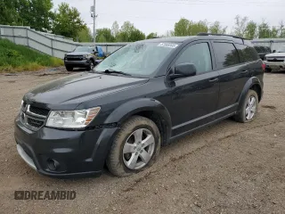 2012 Dodge Journey SXT with VIN 3C4PDDBG5CT226207, listed as a Copart auction lot 57668305 with 201,404 mi miles and Clean title. Bid and sale history available at DreamBid. Image 1.