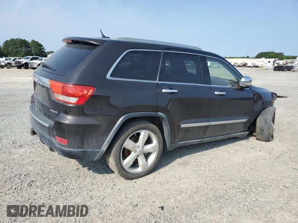 2011 Jeep Grand Cherokee Overland Summit with VIN 1J4RR6GT3BC686143, listed as a Copart auction lot 59218685 with 155,059 mi miles and Salvage title. Bid and sale history available at DreamBid. Image 3.