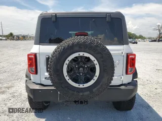 2023 Ford Bronco z VIN 1FMEE5DP5PLB73657, wystawiony jako Copart lot #58473675 z przebiegiem 14 209 mil mil oraz Szkoda całkowita • Salvage title. Historia ofert i sprzedaży dostępna na DreamBid. Obrazek 6.