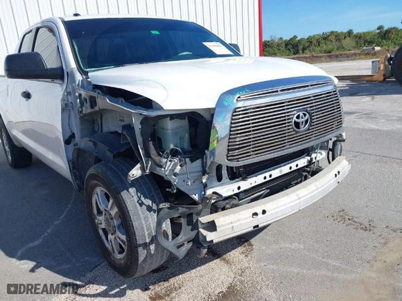 2012 Toyota Tundra 2WD Truck with VIN 5TFRM5F15CX040210, listed as a IAAI auction lot 41395621 with 161,128 mi miles. Bid and sale history available at carsss.com. Image 6.