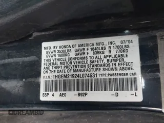 2004 Honda Civic EX with VIN 1HGEM21924L074531, listed as a IAAI auction lot 41615569 with 186,878 mi miles and . Bid and sale history available at DreamBid. Image 9.