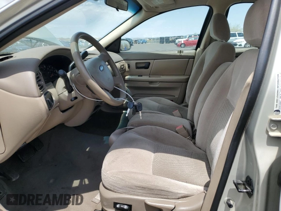 2007 Ford Taurus SE with VIN 1FAFP53U27A156844, listed as a Copart auction lot 59204695 with 157,633 mi miles and Salvage title. Bid and sale history available at DreamBid. Image 7.