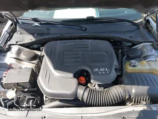 2018 Chrysler 300 with VIN 2C3CCABGXJH243837, listed as a IAAI auction lot 41748996 with 167,978 mi miles. Bid and sale history available at carsss.com. Image 10.