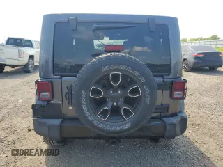 2018 Jeep Wrangler JK Unlimited Altitude with VIN 1C4BJWEG1JL848998, listed as a Copart auction lot 71987874 with 69,701 mi miles and Salvage Title. Bid and sale history available at carsss.com. Image 6.