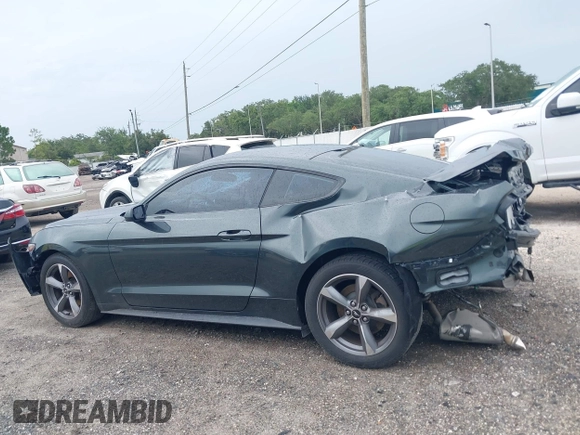 2015 Ford Mustang V6 with VIN 1FA6P8AM3F5344333, listed as a IAAI auction lot 42623531 with 121,278 mi miles and . Bid and sale history available at DreamBid. Image 14.