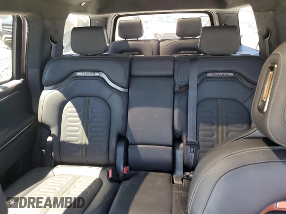2024 Rivian R1S Adventure z VIN 7PDSGABA7RN034025, wystawiony jako Copart lot #49332795 z przebiegiem Nie podano mil oraz Szkody całkowita. Historia ofert i sprzedaży dostępna na DreamBid. Obrazek 10.