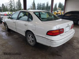1998 Toyota Avalon XL with VIN 4T1BF18B5WU242038, listed as a IAAI auction lot 41577342 with 195,707 mi miles and . Bid and sale history available at DreamBid. Image 3.