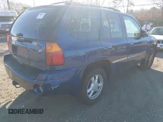 2006 GMC Envoy SLT with VIN 1GKDT13S762170322, listed as a IAAI auction lot 41324540 with 999,999 mi miles. Bid and sale history available at carsss.com. Image 4.