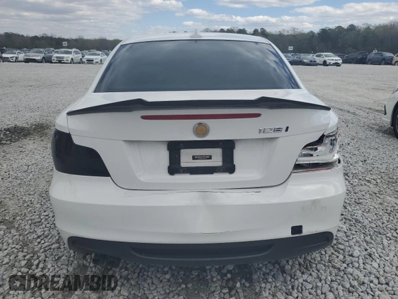 2013 BMW 1 Series 128i with VIN WBAUP7C57DVP25372, listed as a Copart auction lot 49533795 with 93,510 mi miles and Salvage title. Bid and sale history available at DreamBid. Image 6.