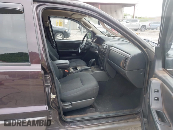 2004 Jeep Grand Cherokee Laredo z VIN 1J4GW48S94C209326, wystawiony jako IAAI lot #42309565 z przebiegiem 159 429 mil mil oraz . Historia ofert i sprzedaży dostępna na DreamBid. Obrazek 5.