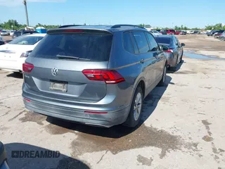 2019 Volkswagen Tiguan S with VIN 3VV1B7AX1KM085354, listed as a IAAI auction lot 42229851 with 85,169 mi miles and . Bid and sale history available at DreamBid. Image 4.