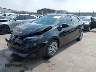 2019 Toyota Corolla L z VIN 5YFBURHE7KP905555, wystawiony jako IAAI lot #41943232 z przebiegiem 83 213 mil mil oraz . Historia ofert i sprzedaży dostępna na DreamBid. Obrazek 23.
