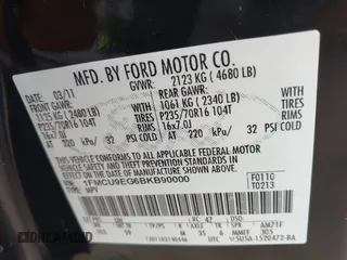 2011 Ford Escape Limited with VIN 1FMCU9EG6BKB90000, listed as a IAAI auction lot 42002010 with 215,825 mi miles. Bid and sale history available at carsss.com. Image 9.
