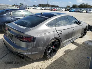 2022 Audi RS 5 Sportback z VIN WUAAWCF57NA901250, wystawiony jako Copart lot #77305584 z przebiegiem Nie podano mil oraz Nie do naprawy. Historia ofert i sprzedaży dostępna na DreamBid. Obrazek 3.