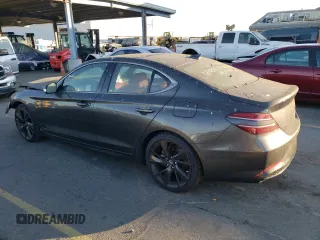 2023 Genesis G70 2.0T with VIN KMTG34TA1PU122906, listed as a Copart auction lot 73328364 with 11,439 mi miles and Salvage Title. Bid and sale history available at carsss.com. Image 2.