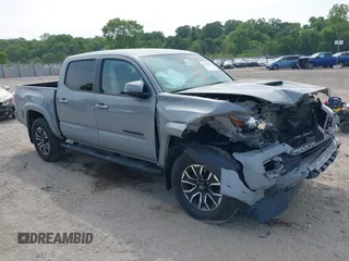 2021 Toyota Tacoma SR with VIN 3TMCZ5AN2MM393285, listed as a IAAI auction lot 42376953 with 37,827 mi miles and . Bid and sale history available at DreamBid. Image 1.