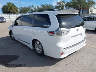2015 Toyota Sienna SE with VIN 5TDXK3DC4FS678965, listed as a IAAI auction lot 40817635 with 147,027 mi miles. Bid and sale history available at carsss.com. Image 3.