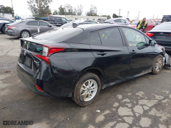 2019 Toyota Prius L Eco with VIN JTDKARFU6K3074058, listed as a IAAI auction lot 41741499 with 70,834 mi miles. Bid and sale history available at carsss.com. Image 4.