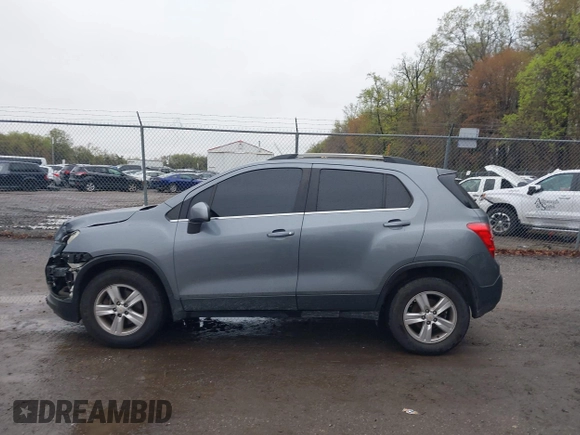 2015 Chevrolet Trax LT with VIN KL7CJRSBXFB097960, listed as a IAAI auction lot 41976883 with 98,621 mi miles and . Bid and sale history available at carsss.com. Image 14.