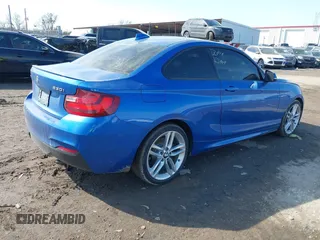 2017 BMW 2 Series 230i xDrive with VIN WBA2H9C32HV642565, listed as a IAAI auction lot 41675092 with 35,929 mi miles. Bid and sale history available at carsss.com. Image 4.