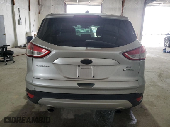 2013 Ford Escape SE with VIN 1FMCU0GX3DUD66890, listed as a Copart auction lot 86477264 with 142,722 mi miles and Salvage Title. Bid and sale history available at DreamBid. Image 6.