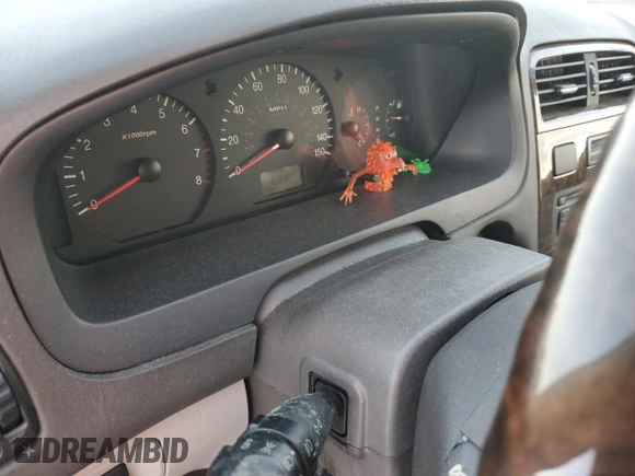 2003 Hyundai XG z VIN KMHFU45E63A237404, wystawiony jako Copart lot #77546824 z przebiegiem Nie podano mil oraz Nie do naprawy. Historia ofert i sprzedaży dostępna na DreamBid. Obrazek 9.