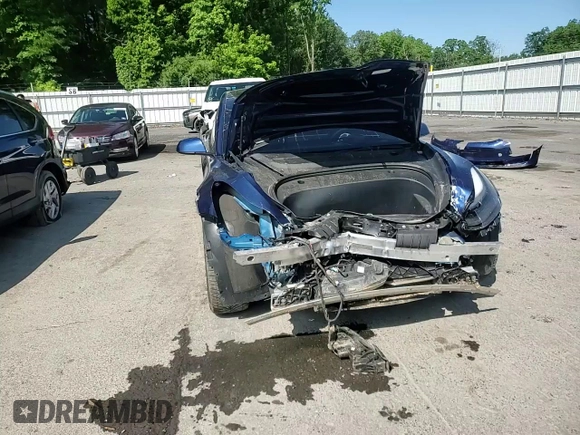 2023 Tesla Model 3 with VIN 5YJ3E1EA3PF436083, listed as a Copart auction lot 58864425 with 41,831 mi miles and Salvage title. Bid and sale history available at DreamBid. Image 14.