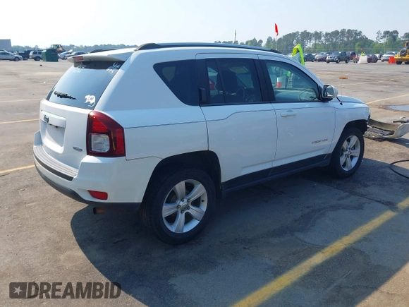 2014 Jeep Compass Latitude with VIN 1C4NJCEB7ED794428, listed as a IAAI auction lot 41995264 with 182,413 mi miles. Bid and sale history available at carsss.com. Image 4.