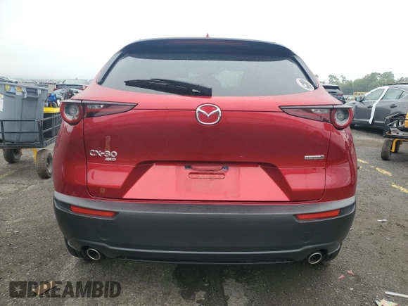 2021 Mazda CX-30 Premium with VIN 3MVDMBDL5MM212318, listed as a Copart auction lot 61057745 with 52,304 mi miles and Salvage title. Bid and sale history available at DreamBid. Image 6.