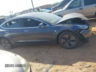 2019 Tesla Model 3 Long Range with VIN 5YJ3E1EB2KF510398, listed as a IAAI auction lot 42067654 with 108,971 mi miles and . Bid and sale history available at DreamBid. Image 12.