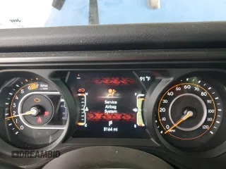 2024 Jeep Wrangler Sport S with VIN 1C4PJXAN8RW169420, listed as a Copart auction lot 62593945 with 5,164 mi miles and Salvage title. Bid and sale history available at DreamBid. Image 9.