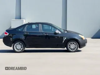 2008 Ford Focus SE with VIN 1FAHP35N28W24058, listed as a Copart auction lot 66020775 with 164,683 mi miles and Clean title. Bid and sale history available at DreamBid. Image 2.
