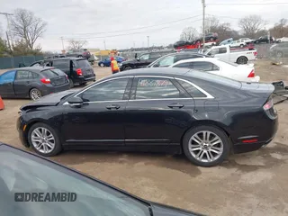2014 Lincoln MKZ with VIN 3LN6L2G90ER832698, listed as a IAAI auction lot 41887879 with 141,798 mi miles and . Bid and sale history available at DreamBid. Image 14.