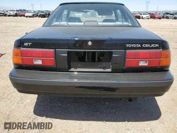 1989 Toyota Celica z VIN JT2ST67C8K7337876, wystawiony jako Copart lot #57918785 z przebiegiem 16 862 mil mil oraz Tytuł czysty. Historia ofert i sprzedaży dostępna na DreamBid. Obrazek 6.