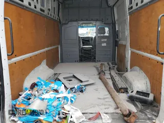 2018 Nissan NV Cargo SV z VIN 1N6AF0LY5JN805076, wystawiony jako Copart lot #56112895 z przebiegiem 229 785 mil mil oraz Tytuł czysty. Historia ofert i sprzedaży dostępna na DreamBid. Obrazek 10.