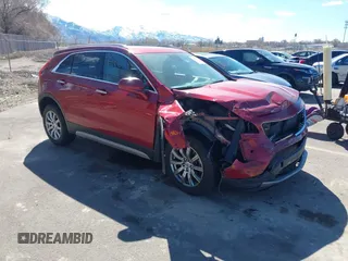 2019 Cadillac XT4 AWD Premium Luxury with VIN 1GYFZDR44KF133013, listed as a IAAI auction lot 41868561 with 96,956 mi miles and . Bid and sale history available at DreamBid. Image 1.
