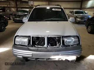 2002 Chevrolet Tracker LT z VIN 2CNBJ634126927635, wystawiony jako Copart lot #78814333 z przebiegiem 224 726 mil mil oraz Szkoda całkowita • Salvage title. Historia ofert i sprzedaży dostępna na DreamBid. Obrazek 5.