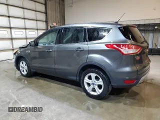 2015 Ford Escape SE with VIN 1FMCU9GX9FUC84511, listed as a Copart auction lot 47445285 with 88,400 mi miles and Salvage Title. Bid and sale history available at DreamBid. Image 2.