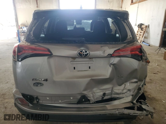 2018 Toyota RAV4 LE with VIN JTMBFREV4JJ192728, listed as a Copart auction lot 48148025 with 58,002 mi miles and Salvage title. Bid and sale history available at DreamBid. Image 6.