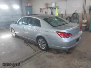 2005 Toyota Avalon XL with VIN 4T1BK36BX5U045813, listed as a IAAI auction lot 42061631 with 150,436 mi miles. Bid and sale history available at carsss.com. Image 3.