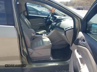 2013 Ford Escape SEL with VIN 1FMCU0HX3DUB37785, listed as a IAAI auction lot 41863069 with 179,508 mi miles. Bid and sale history available at carsss.com. Image 5.