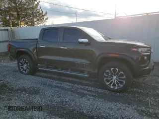2023 GMC Canyon 4WD Denali with VIN 1GTP6FEK2P1219170, listed as a Copart auction lot 80591493 with 3,985 mi miles. Bid and sale history available at carsss.com. Image 4.