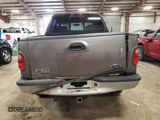 2002 Ford F-150 XLT with VIN 1FTRW08L92KD19411, listed as a Copart auction lot 50986795 with 164,556 mi miles and Clean Title. Bid and sale history available at carsss.com. Image 6.