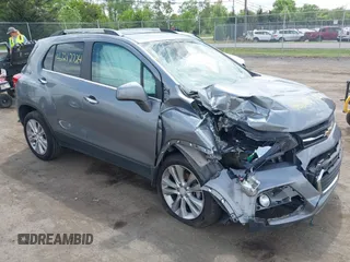 2020 Chevrolet Trax Premier with VIN 3GNCJRSB2LL140689, listed as a IAAI auction lot 42212724 with 73,701 mi miles and . Bid and sale history available at DreamBid. Image 1.